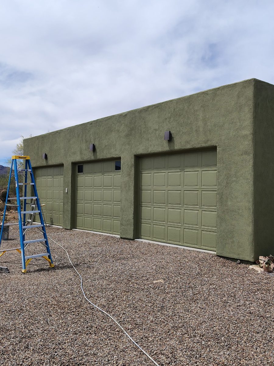 Finished detached three-car garage with stucco exterior, Tucson area