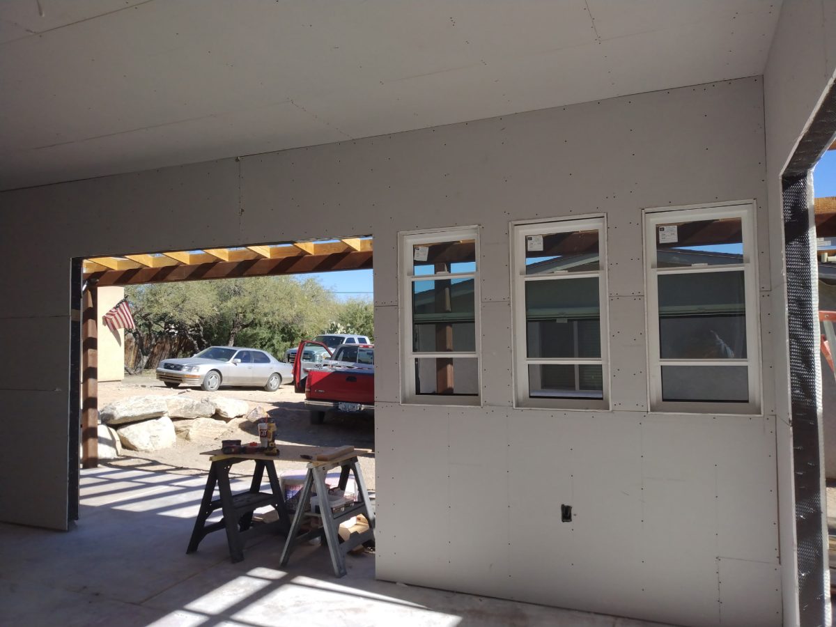 Room addition with new windows installed and drywall hung, Tucson area